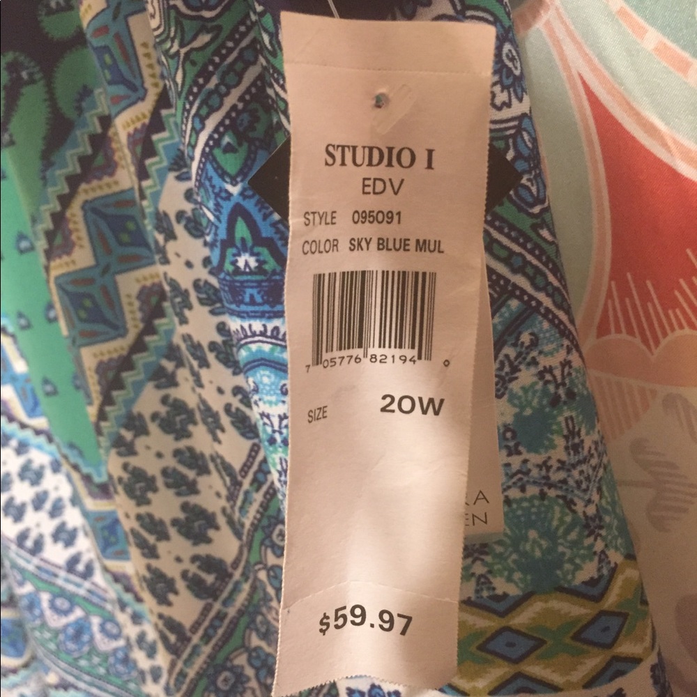 Dress with multicolored design with tags. Size 20